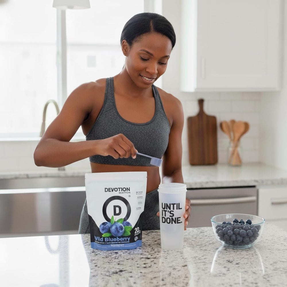 Devotion Nutrition Wild Blueberry pancakes topped with fresh fruit for extra protein.