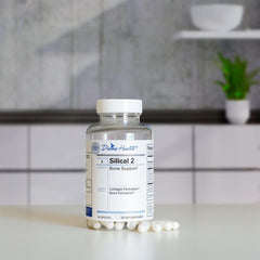 Divine Health Silical 2 pills close-up highlighting capsules for calcium and vitamin D support