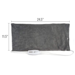 DMI heating pad in use on back for targeted relief.