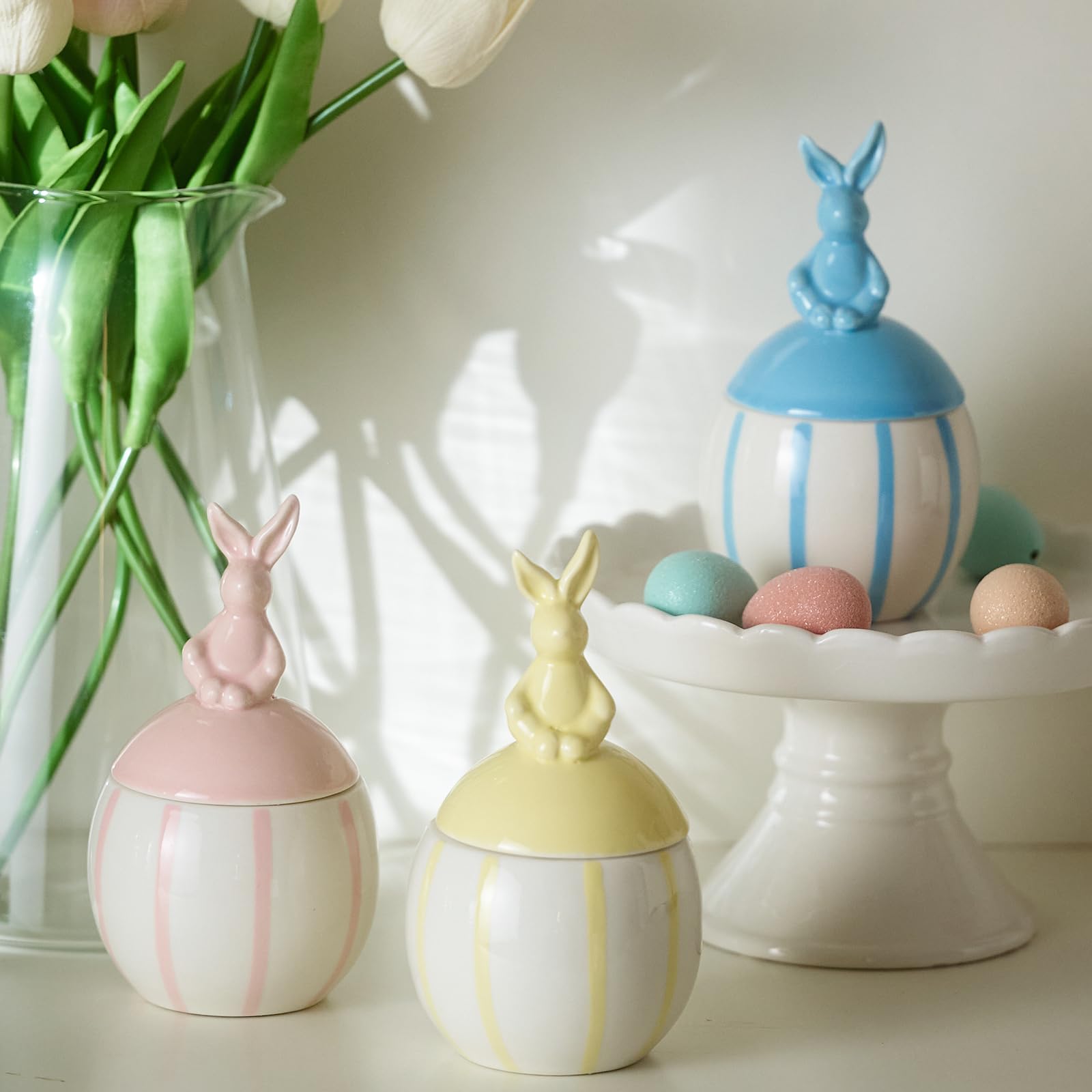 DN Deconation Easter Bunny yellow egg-shaped ceramic candle brightens any room.