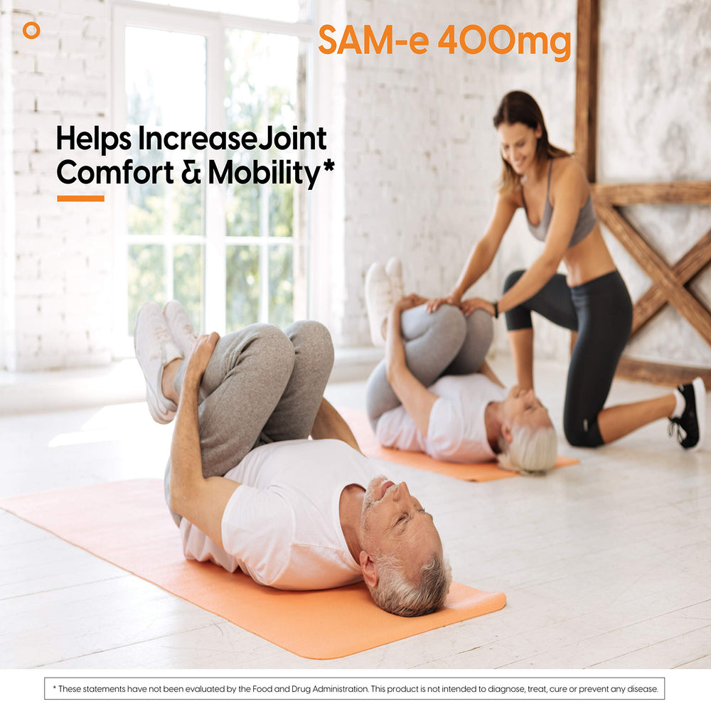 Hands holding SAMe 400 mg tablets emphasizing portable daily support.