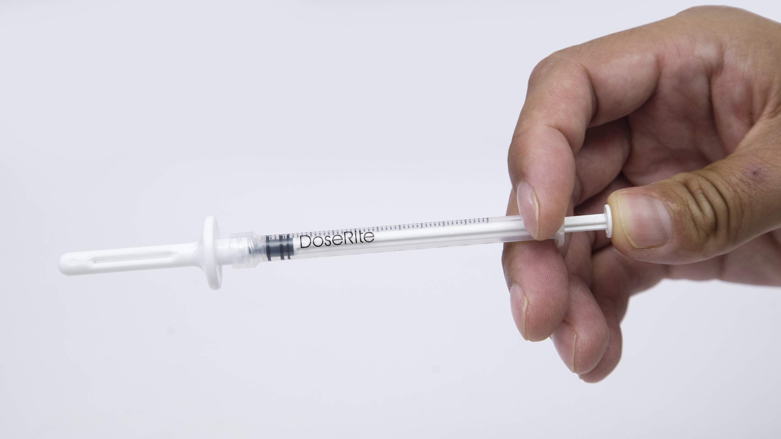 DoseRite tube-to-syringe adapter ensures clean, compatible setup.