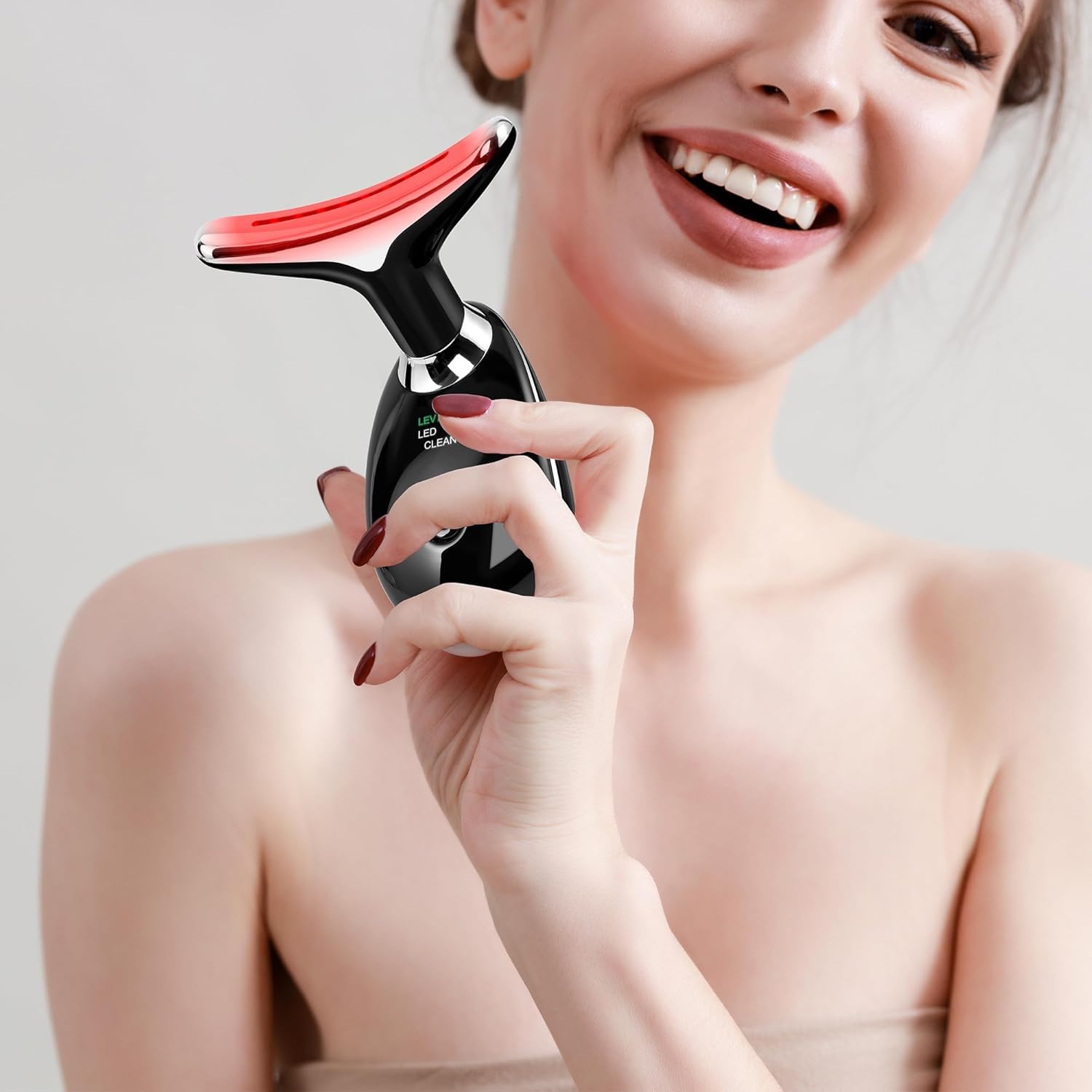 Doset facial massager with user manual for setup and care.