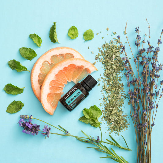 doTERRA AromaTouch ingredients close-up highlighting basil and lavender for relaxation.
