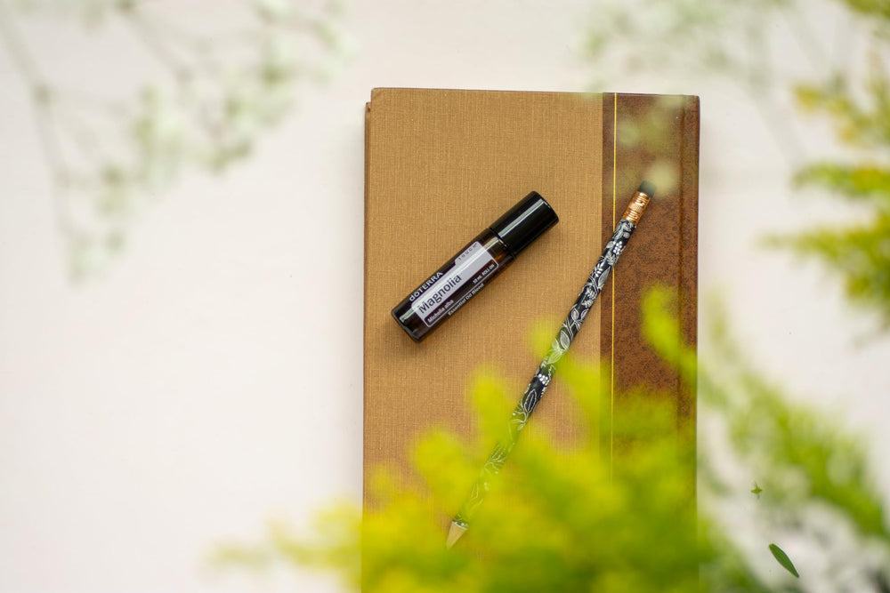 doTERRA Magnolia Touch ingredient emphasis on fractionated coconut oil for easy application.