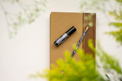 doTERRA Magnolia Touch ingredient emphasis on fractionated coconut oil for easy application.