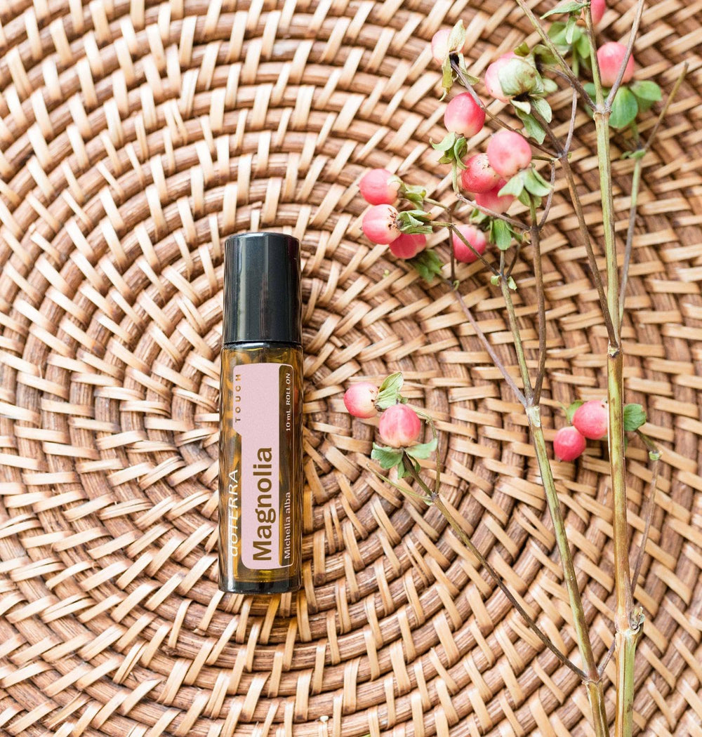 doTERRA Magnolia Touch skin care application showing gentle, soothing use on skin.