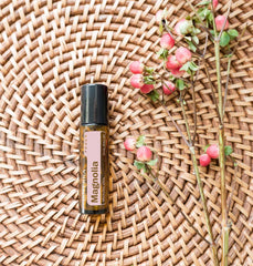 doTERRA Magnolia Touch skin care application showing gentle, soothing use on skin.