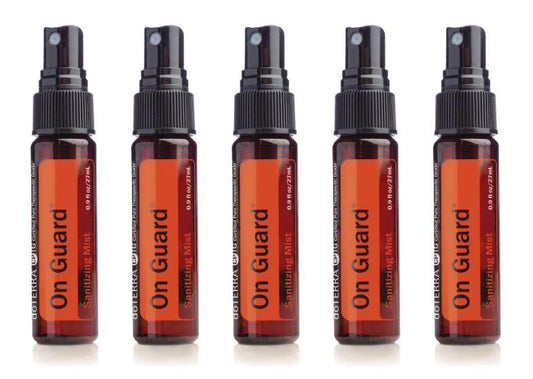 doTERRA On Guard Sanitizing Mist bottle highlights quick-drying sanitizer for clean, refreshed hands.