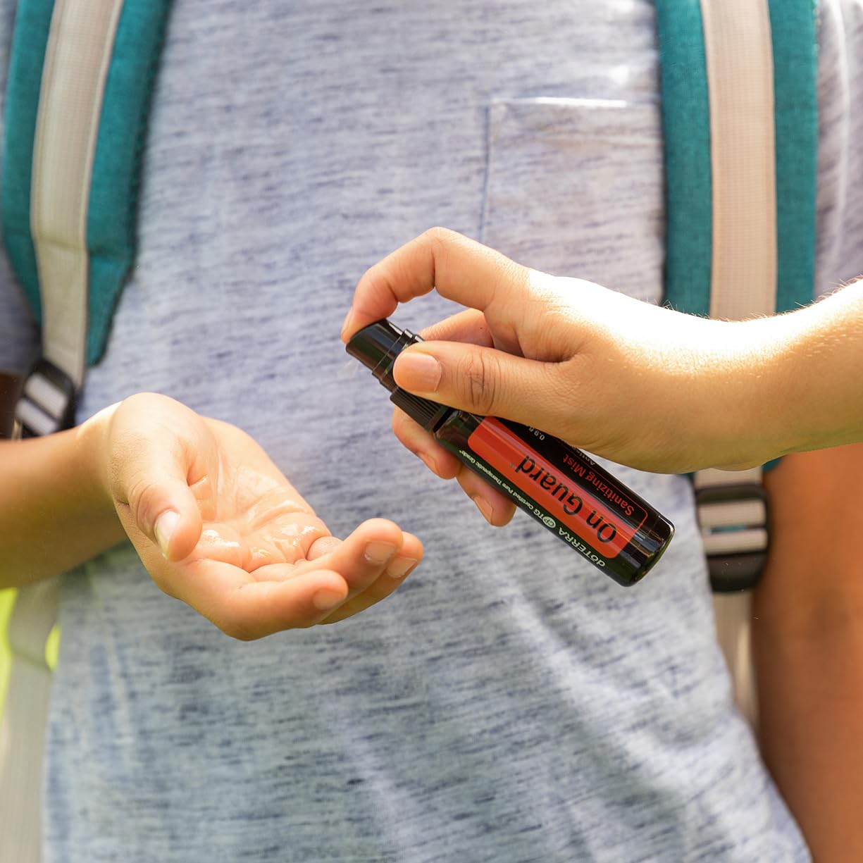 doTERRA On Guard Sanitizing Mist with apple extract for moisturized, soft hands after use.