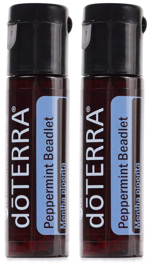 doTERRA Peppermint beadlets bottle close-up, convenient oral care and digestive support.