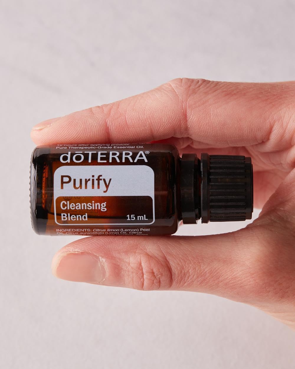 doTERRA Purify drops on cotton ball ready for car vent air purification
