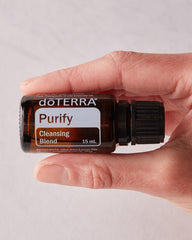 doTERRA Purify drops on cotton ball ready for car vent air purification