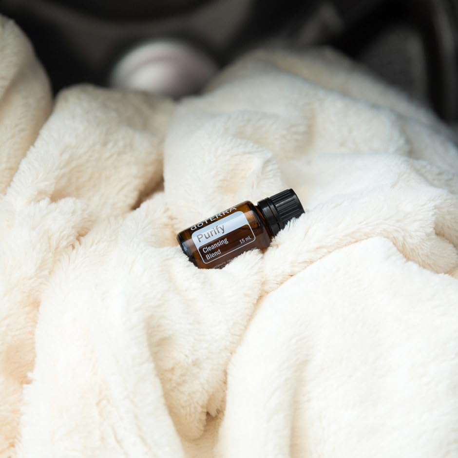 doTERRA Purify spray bottle used for countertops to wipe away odors