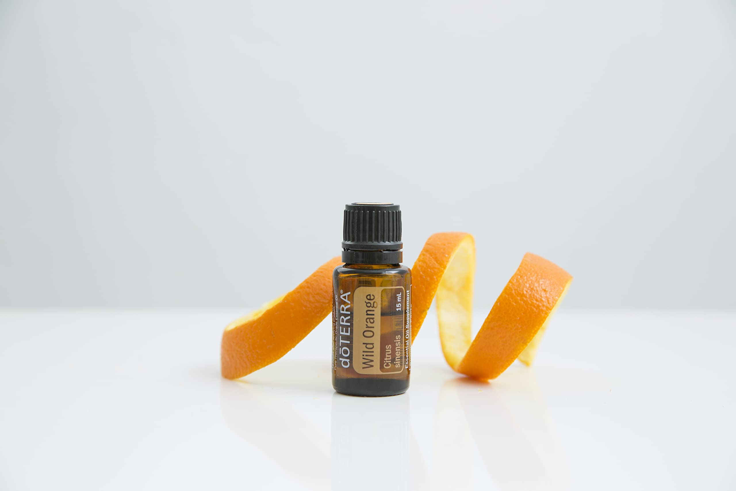 doTERRA Wild Orange bottle on counter ready for crafting blends