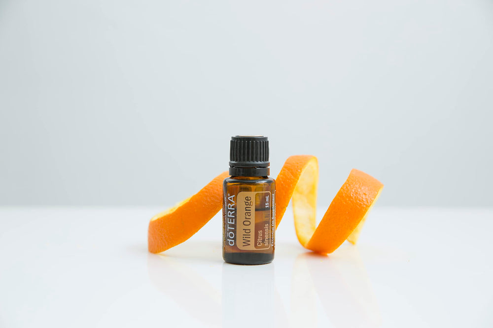 doTERRA Wild Orange bottle on counter ready for crafting blends