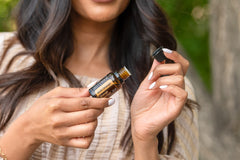 doTERRA Wild Orange skin oil application on skin for hydrating care
