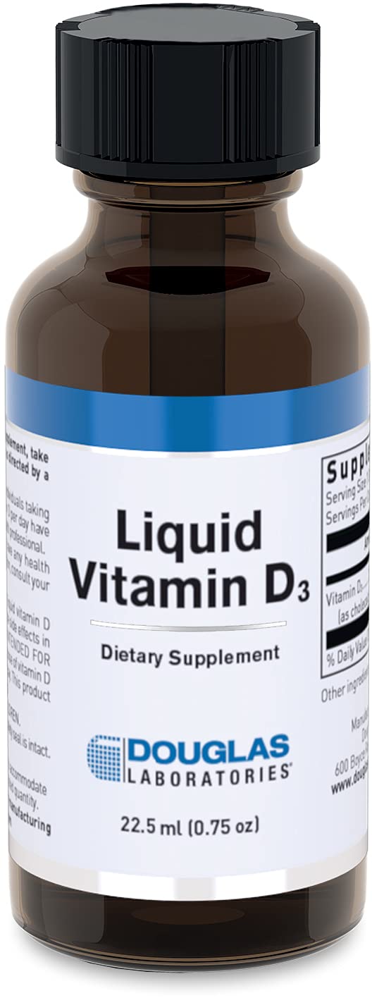 Douglas Laboratories Liquid Vitamin D3 bottle on table supports easy daily supplementation.