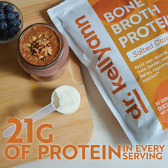 Dr. Kellyann Bone Broth Protein pouring shot showing smooth, sugar-free formula.