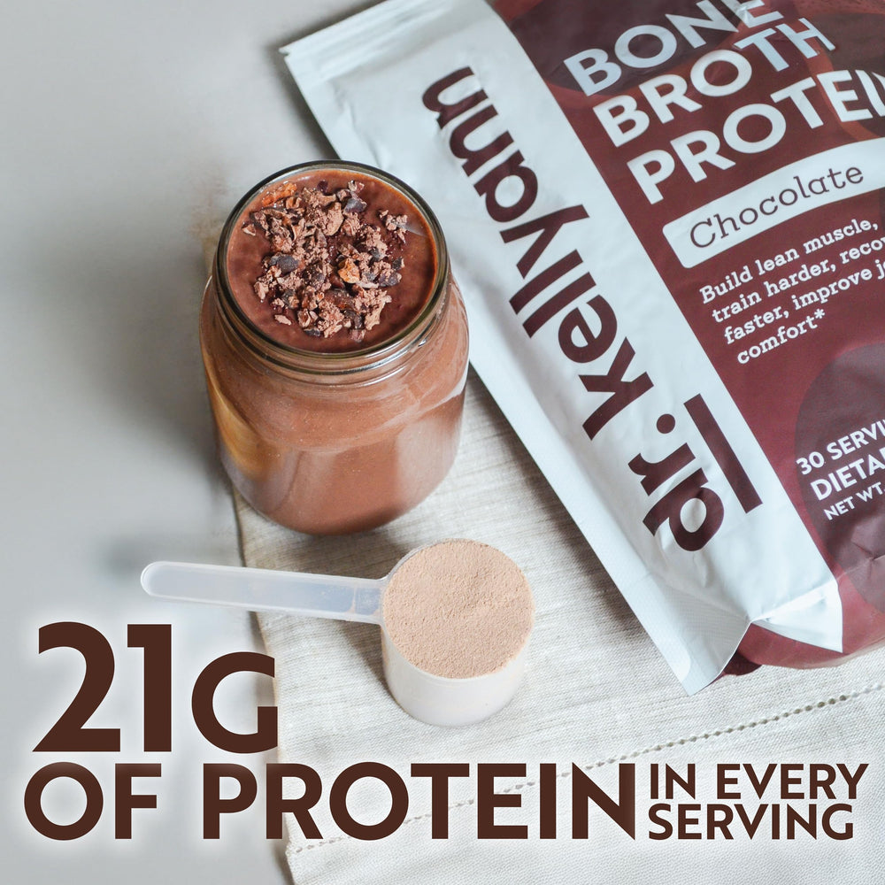 Close-up texture of Dr. Kellyann Keto Bone Broth Protein Powder Chocolate powder.
