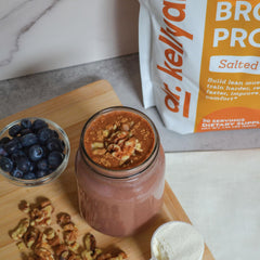 Dr. Kellyann shake with salted caramel powder demonstrates creamy, crave-worthy texture.