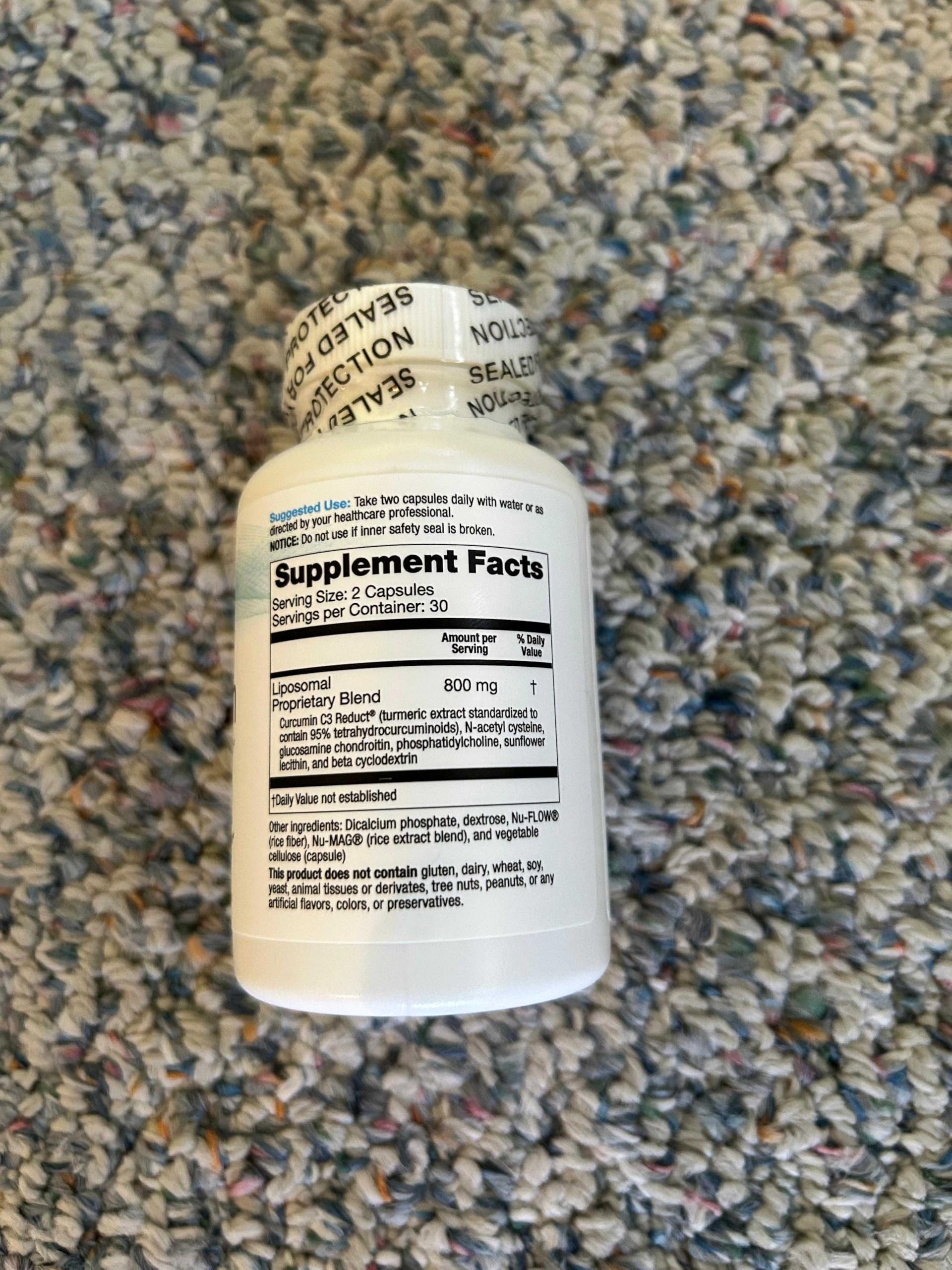 Dr Lewis Nutrition liposomal turmeric illustrating advanced delivery system.