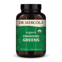Dr. Mercola Organic Fermented Greens bottle close-up illustrating vibrant greens for daily nutrition support.