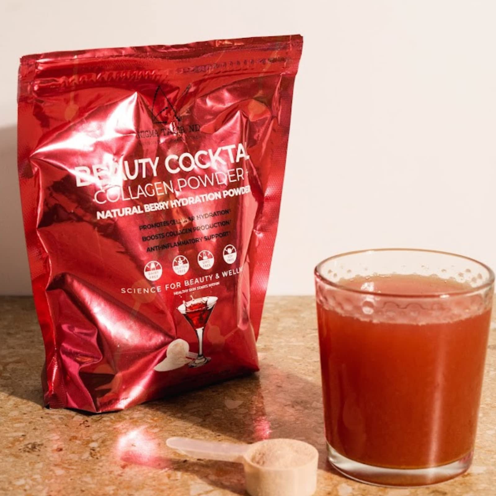 DR. NIGMA Beauty Cocktail powder blend image emphasizing electrolytes and marine peptide