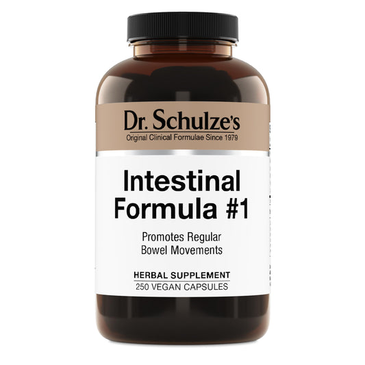 Dr. Schulze's Intestinal Formula #1 bottle pour shows plant-based bowel support for daily wellness.