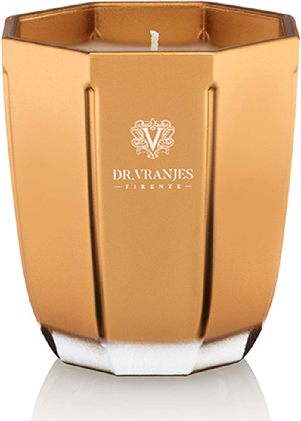 Dr. Vranjes Oro Oud Nobile candle in glass vase enhances luxurious ambiance.