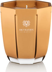 Dr. Vranjes Oro Oud Nobile candle in glass vase enhances luxurious ambiance.