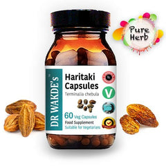 Close-up of DR WAKDE'S Haritaki capsules showing pure herbal form for daily use.
