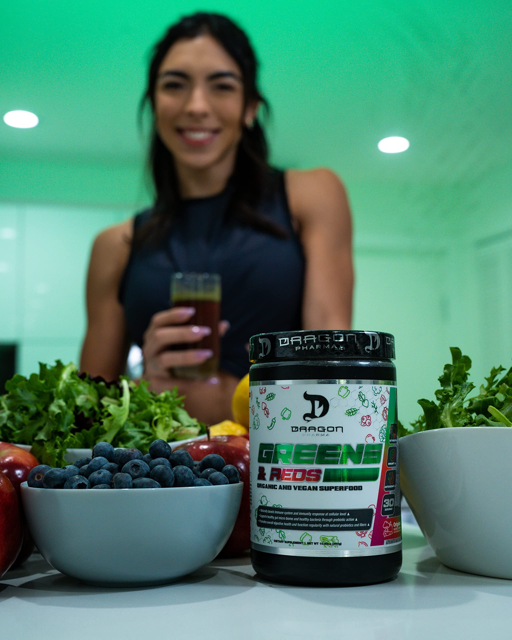 Dragon Pharma Greens and Reds powder stirred into yogurt for a balanced breakfast.