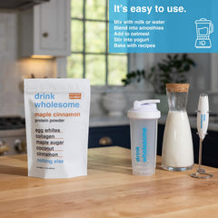 Pour action of Drink Wholesome Maple Cinnamon Egg White Protein Powder showing versatile, stomach-friendly nourishment.