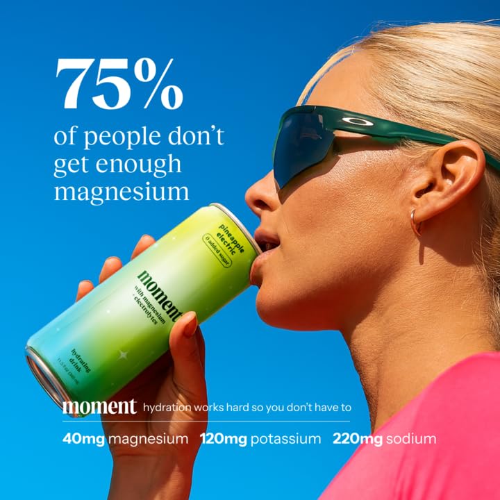 Moment Pineapple on-the-go bottle in a backpack for refreshment.
