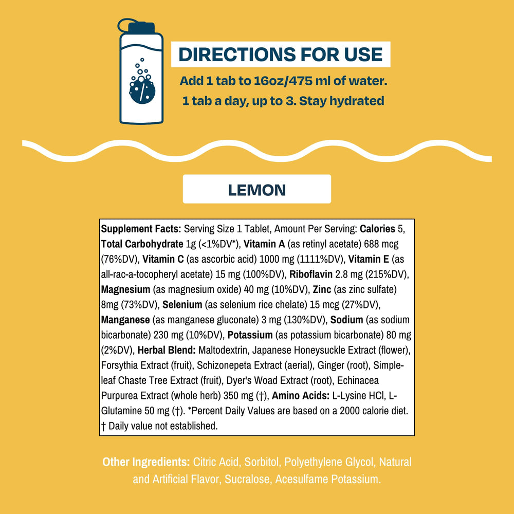 Drinklits Lemon Immune Tablets dissolving in a glass of refreshing lemon fizz.