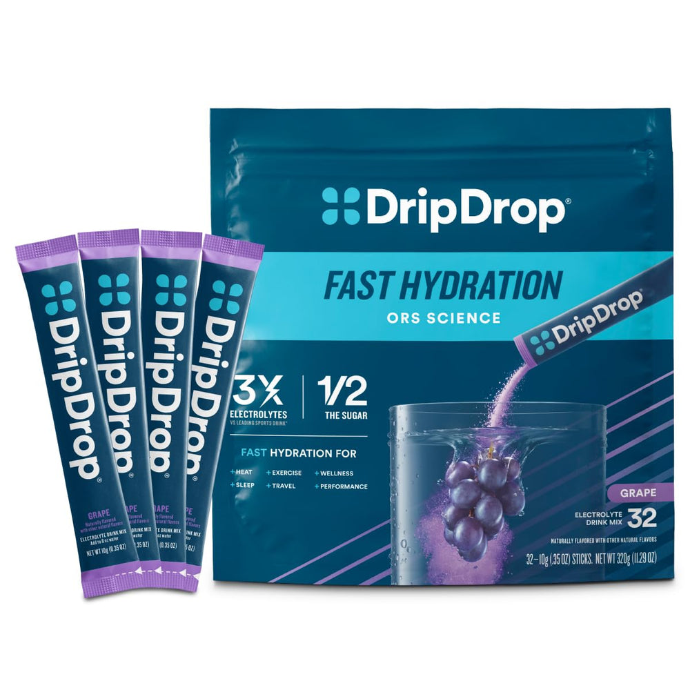 DripDrop grape single-serve hydration packet dissolving in water for on-the-go hydration.