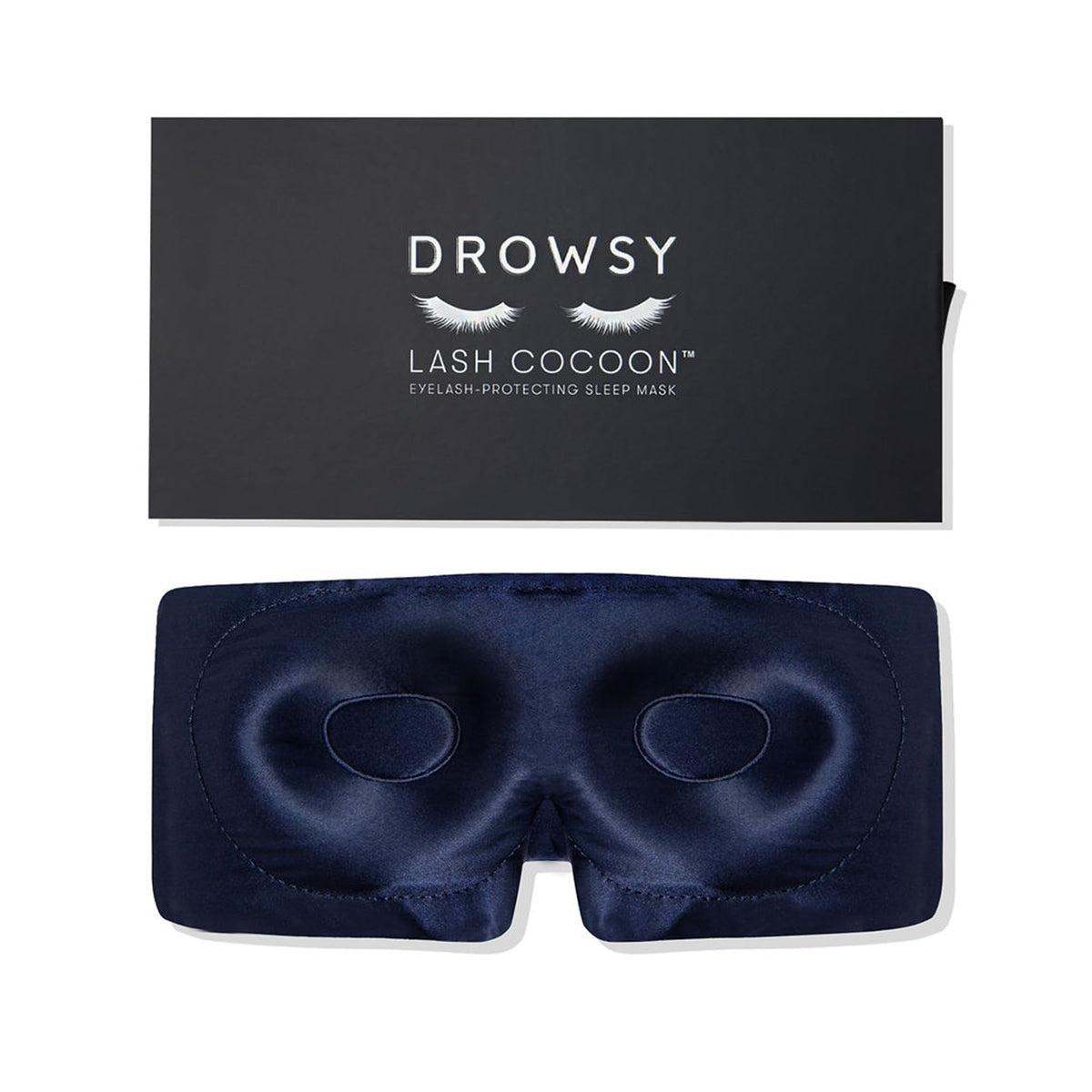 Drowsy eyelash-protecting silk sleep mask in midnight blue shields lashes gently.