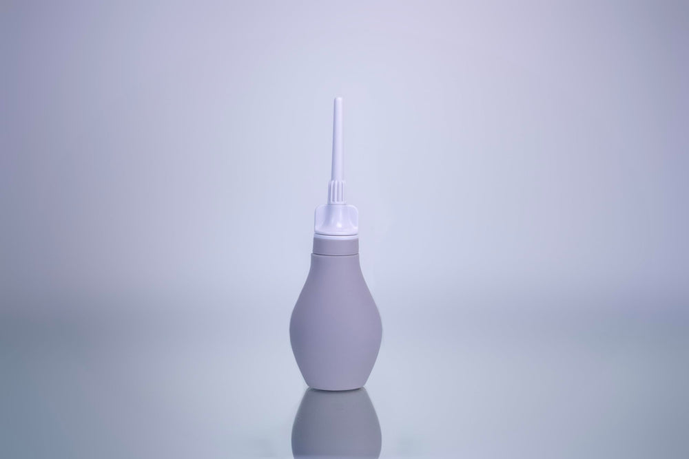 Du silicone anal enema kit packaging emphasizes travel-ready components for on-the-go cleansing.