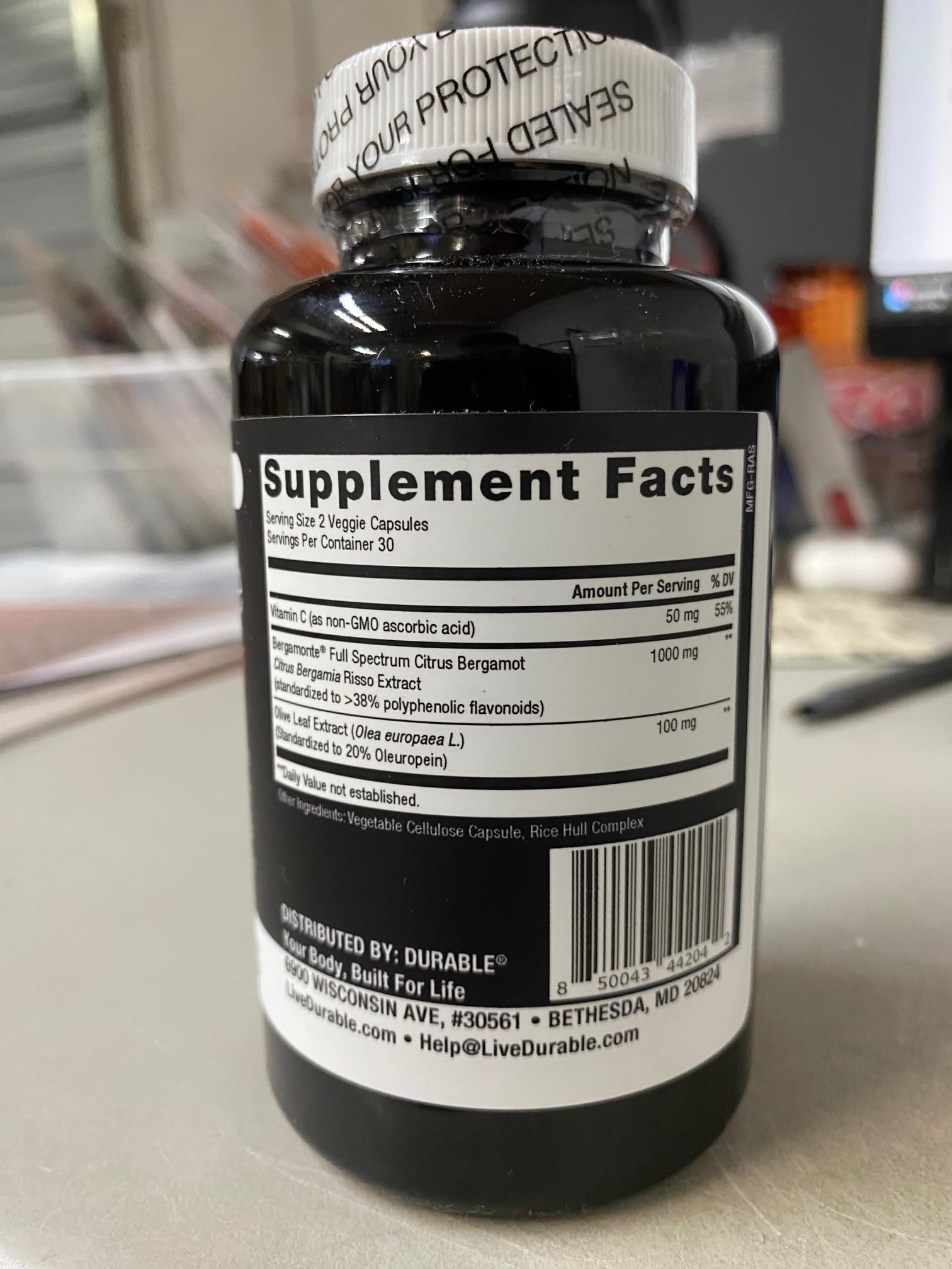 Durable Heart bottle with 60 capsules on shelf.