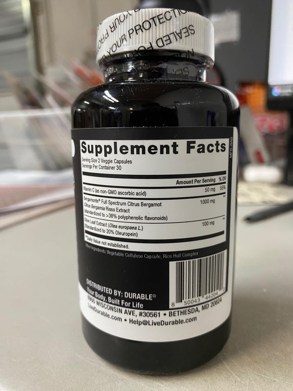 Durable Heart bottle with 60 capsules on shelf.