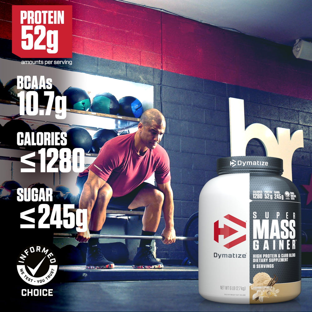 Scoop of Dymatize Super Mass Gainer ready for measuring and mixing.