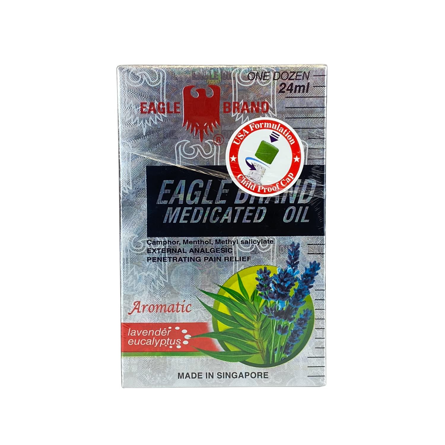 Applying Eagle Brand medicated oil to the skin on the arm