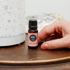 Edens Garden Amyris essential oil dropper close-up showing precise dilution for blends.