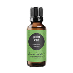 Edens Garden Buddha Wood bottle pour for earthy grounding aroma.