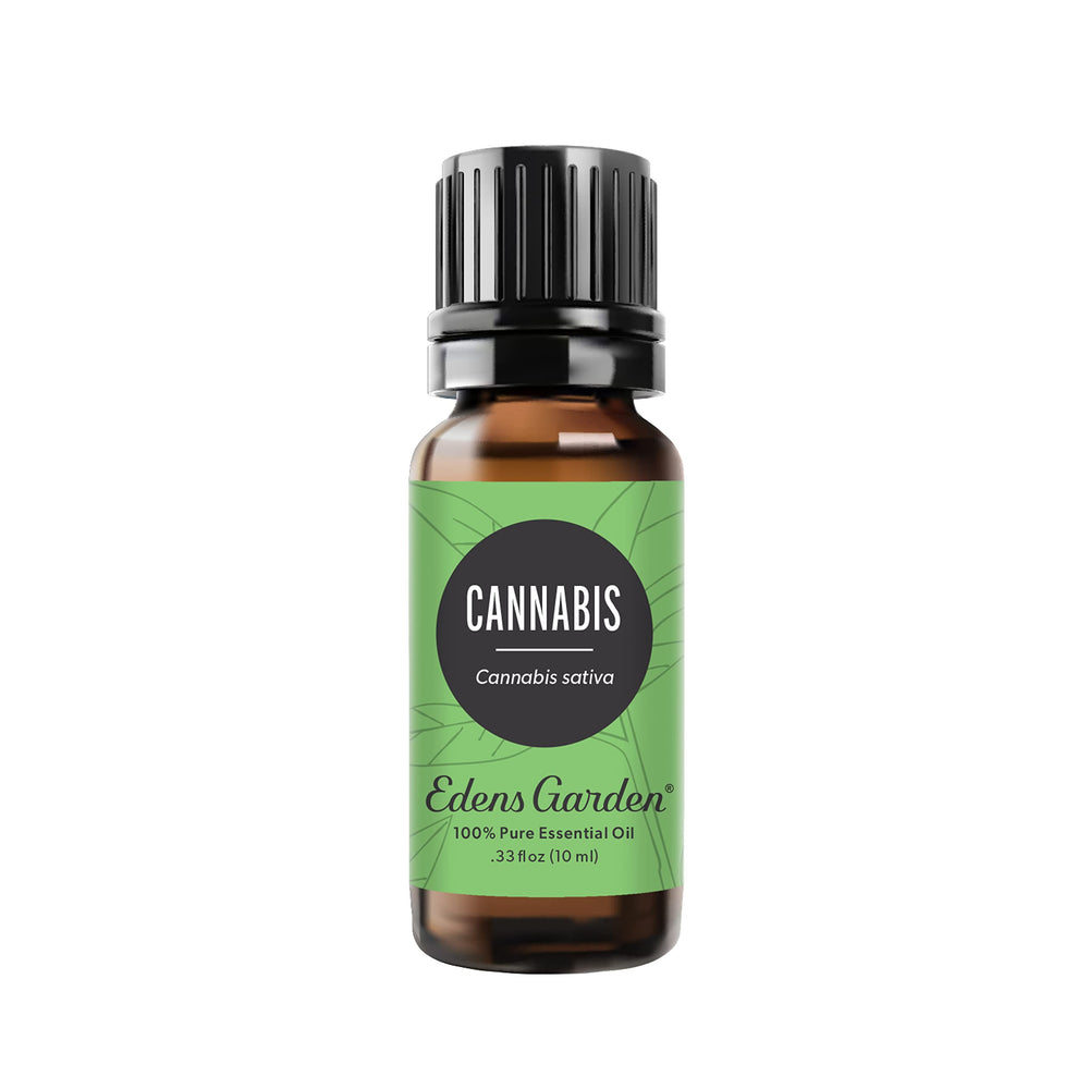 Edens Garden Cannabis Essential Oil bottle pour showing rich earthy aroma for diffusers