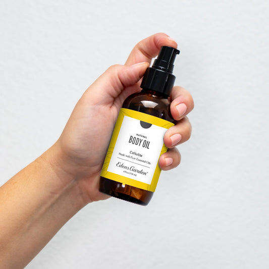 Edens Garden cellulite oil pour demonstrates easy application and calming scent