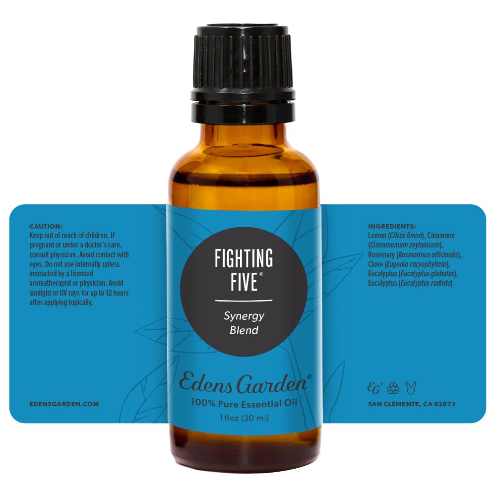 Edens Garden Fighting Five diffuser near candle invites cozy atmosphere.
