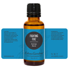 Edens Garden Fighting Five diffuser near candle invites cozy atmosphere.