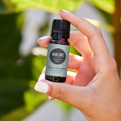 Edens Garden Hair Love bottle pours for scalp massage rituals.